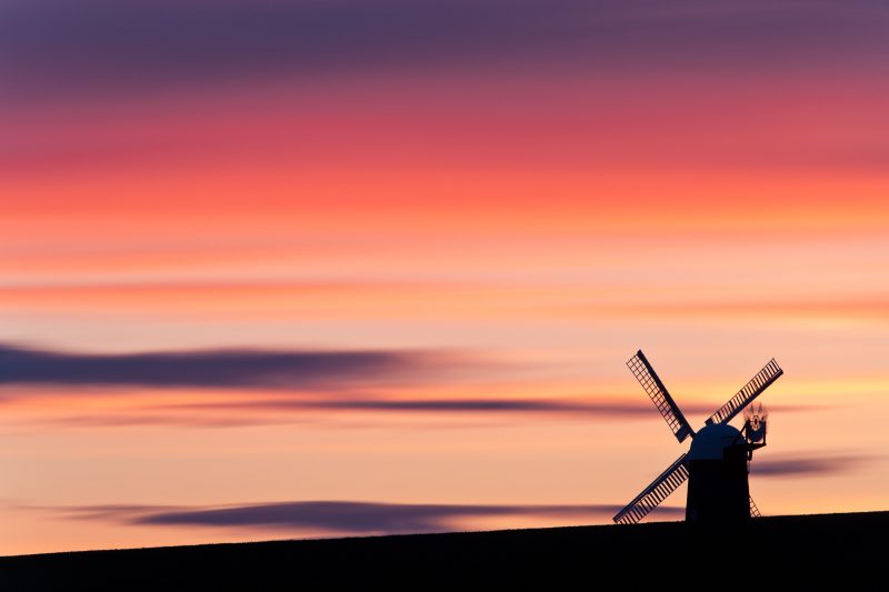 Wilton Windmill silhouetted against colourful sunset